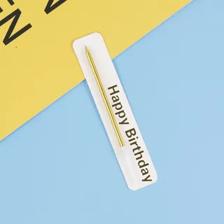 Single candle with happy birthday topper