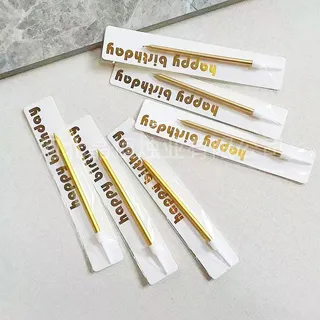 Single candle with happy birthday topper