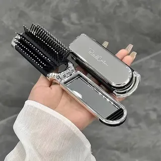 Foldable hair brush with mirror