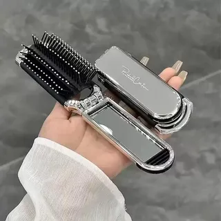 Foldable hair brush with mirror