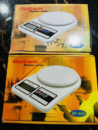 Yellow plastic digital 5kg scale