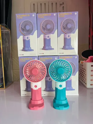 Mini rechargeable fan with phone stand