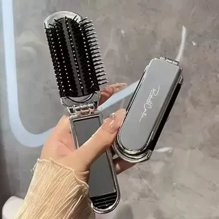 Foldable hair brush with mirror