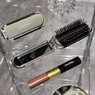Foldable hair brush with mirror