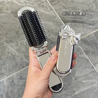 Foldable hair brush with mirror