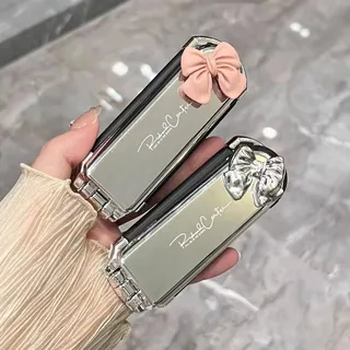 Foldable hair brush with mirror